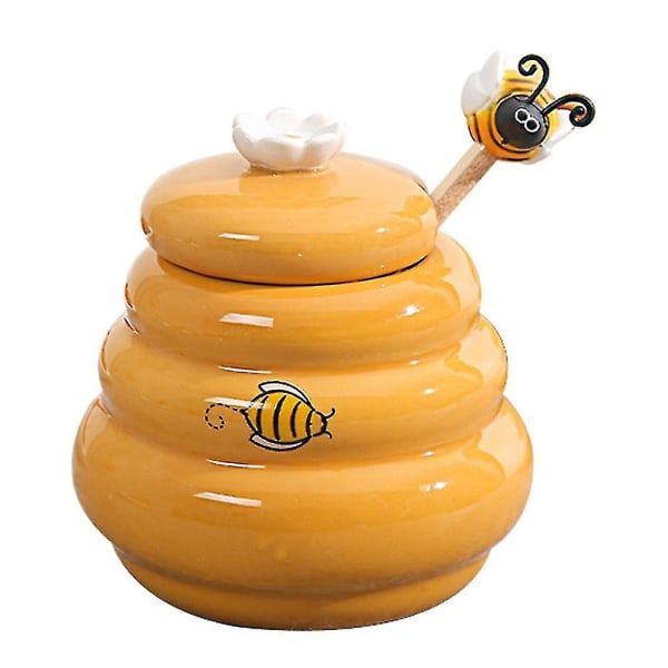Honungsburk med honungskaka i keramik och honungsburk med cover Honungsrörande stick honungsburk