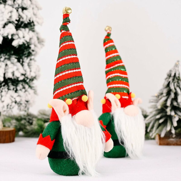 Julepynt, lange strikkede ører med bjeller, gamle skogsdukker, mini skrivebordpynt