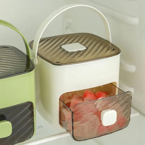 Ice machine with 48 ice cube molds, ice tongs and a large capacity ice container; makes 48 ice cubes. Suitable for home kitchens.