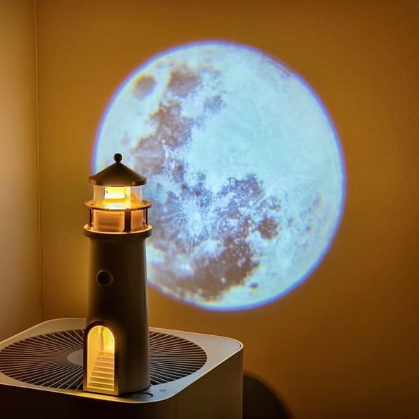 Moonlight Lighthouse Night Light with Bluetooth Speaker Remote Control LED Mood Light and Moon Projection 242mm High.