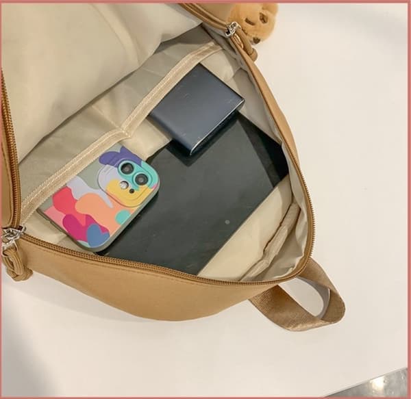 Backpack, 15L Holds laptop in compartment, With Capybara pendant, Brown
