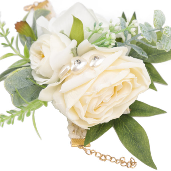 Handledsblommor för bröllop Brud handledsblomma Dekorativa vita rosor och gröna blad för bal