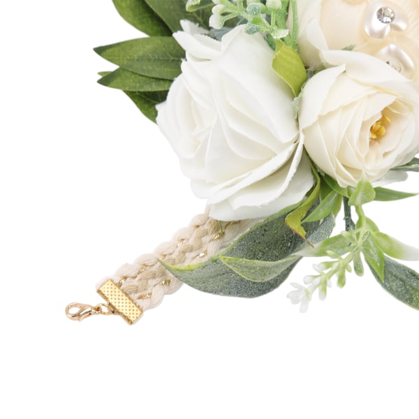 Handledsblommor för bröllop Brud handledsblomma Dekorativa vita rosor och gröna blad för bal