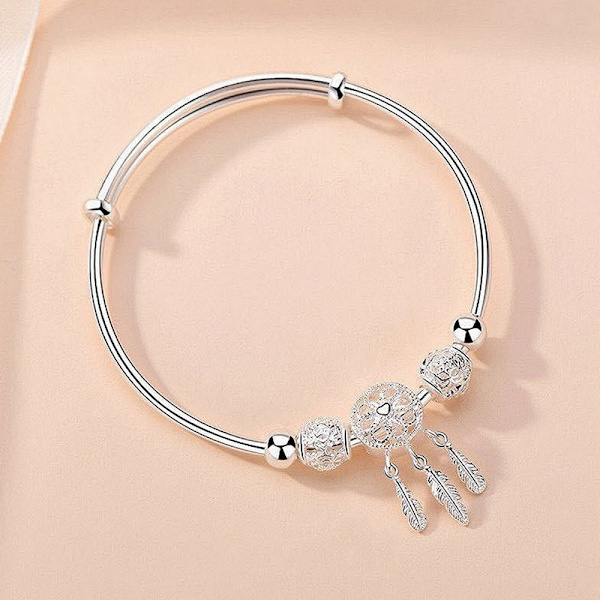 Expanderbar armband för kvinnor, glänsande silverfinish med drömfångarberlock