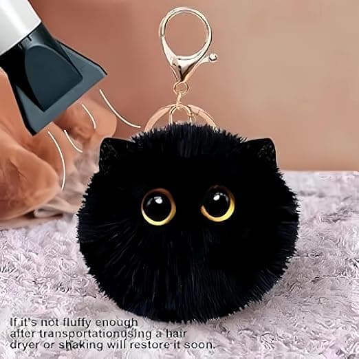 Sæt med 2 sorte kattenøgleringe, en perfekt gave til katteelskere med søde plysrygsækcharms og fluffy pom-pom nøgleringe.