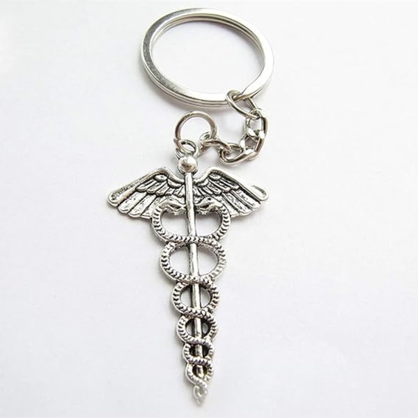 Medicinsk nyckelring Nyckelring Distinkt Wing Snake Charm Bag