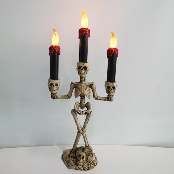 Kolme LED-kynttilää Halloweeniin, liekittömät ja luurankokynttilänpidike
