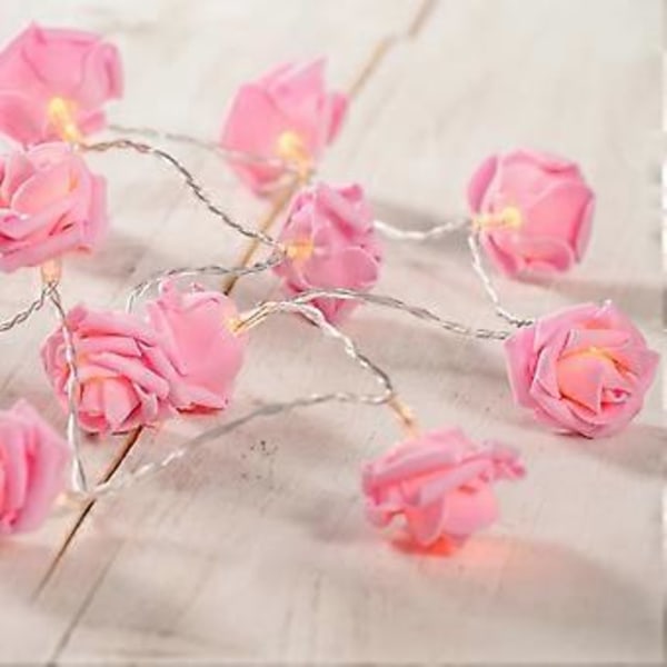 Batteridriven ljusslinga med 20 rosa blommor och varmvita LED-lampor