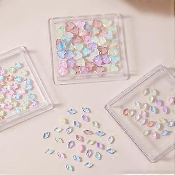 50 st/förpackning Romber Nagelberlocker Hjärtan Nagelkonst Berlocker Manikyr Tillbehör Stjärna Nagel Strass Berlocker DIY Nagelmaterial love