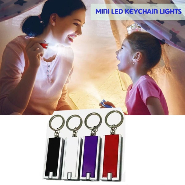 4 delar (vit, svart, röd, lila) Mini LED-nyckelring Bärbar