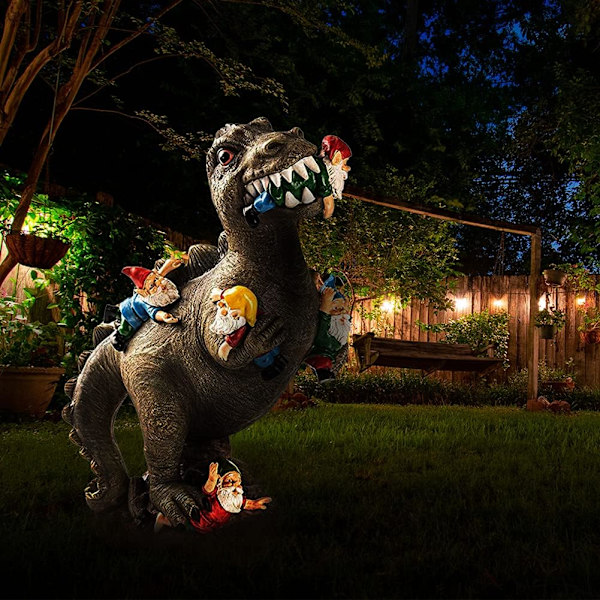 Dinosaur, der spiser havegnom, havefigur, havegnom og dinosaur til