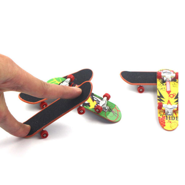 Finger Skateboard, Set med 7 Mini Finger Toys Deck Truck Finger B
