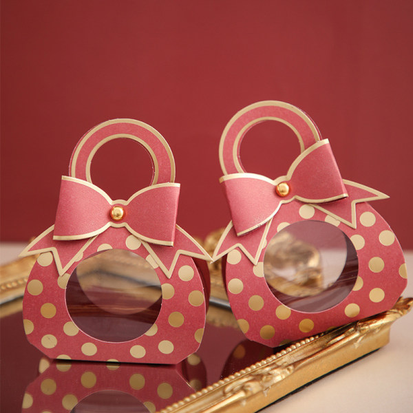 Creative pacifier candy box with a bow design in 3 colors and 3 p