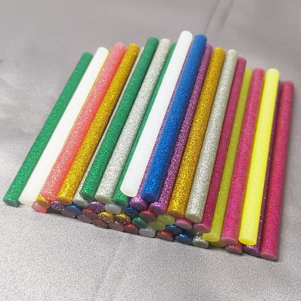 50 kpl monivärisiä monikäyttöisiä kuumaliimapuikkoja, 100 x 7 mm kuumaliimapuikkoja, jotka sopivat kuumaliimapistoolin kanssa