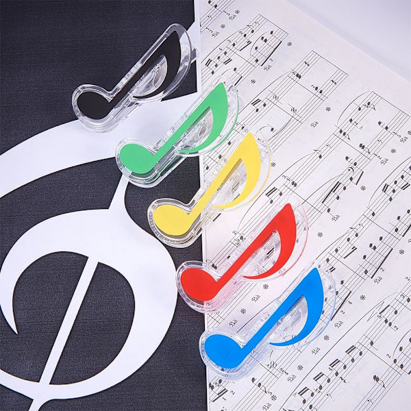 Sæt med 5 plastikclips i form af musiknoter til bøger