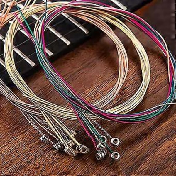 Pakke med 6 farverige akustiske guitarstrenge Folk Guitarstrenge Sæt Forbedrer spilleoplevelsen og nem udskiftning rød kobberstreng red copper string