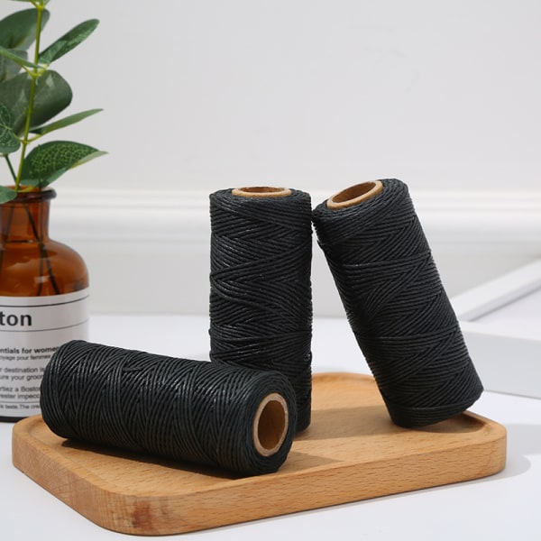 1,5 mm spiralformet sort tau, voksbehandlet polyestertau, brukt til kabelbinding
