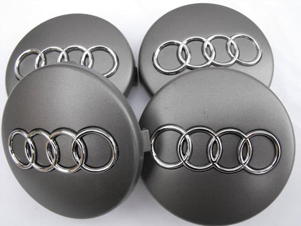 4 nye 60mm sølvfarvede Audi-fælgdæksler, emblemer