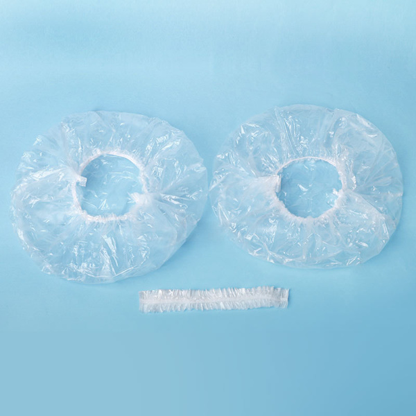 100-pack transparenta engångsduschmössor av klar elastisk plast för badrum