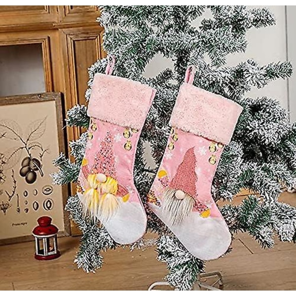 st knallrosa julstrumpor med LED-ljus
