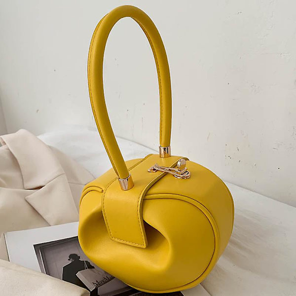 Pääasiallinen luksussuunnittelijan käsilaukku naisille Pieni pyöreä muotoilu Nahkainen käsilaukku naisille 2023 Muoti Keilauslaukku Laukku Keltainen käsilaukku Yellow Handbag