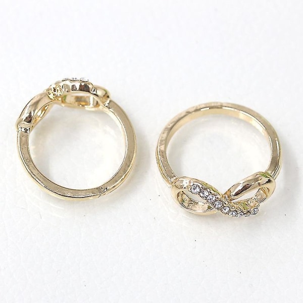 Nytt design Legering Crystal Twist Infinity Gifteringer Kompatibel med Kvinne Gull Sølv Farge Ring Statement Smykker Party Gave Engros 6
