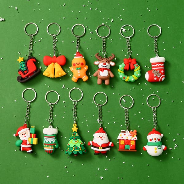 Julklappsset med nyckelringar - 12 unika designer - Presentask med gratis julgransprydnad