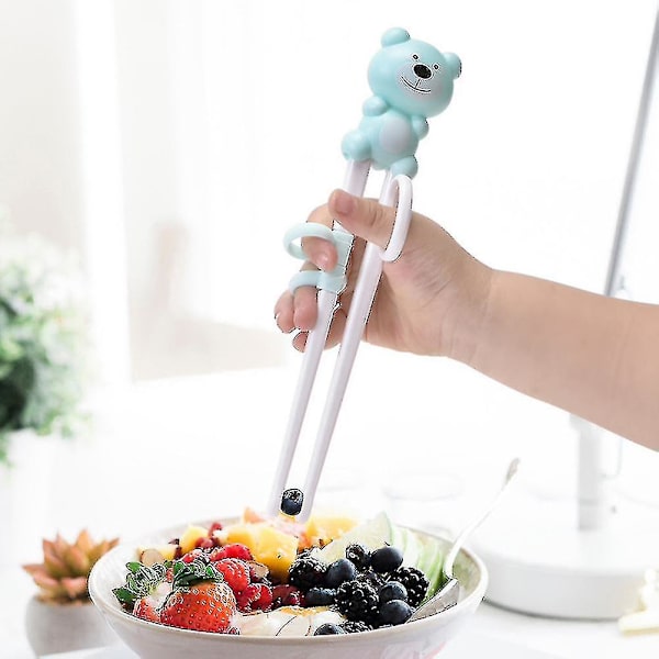 2 paria sarjakuva Kid Eat Training Chopsticks baby oppimisastiasto (vaaleanpunainen sininen)