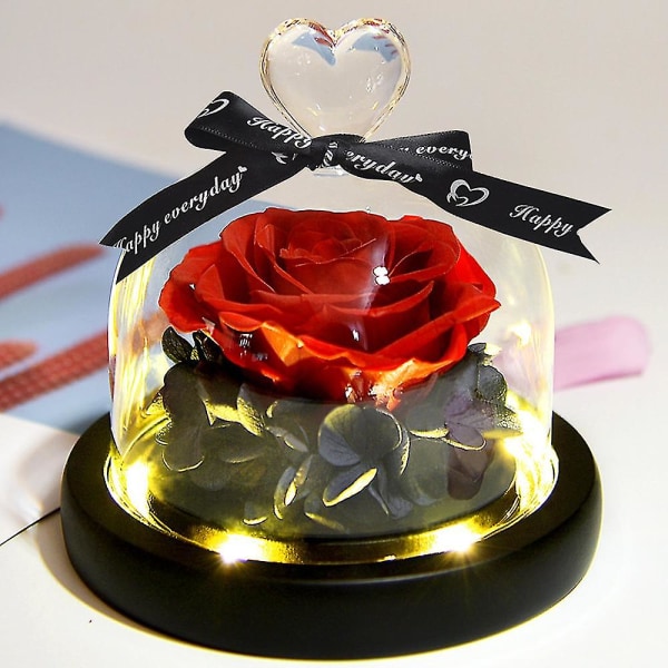 Inuti glasskyddet kommer blommorna aldrig att blekna, en julklapp till älskare och vänner. red