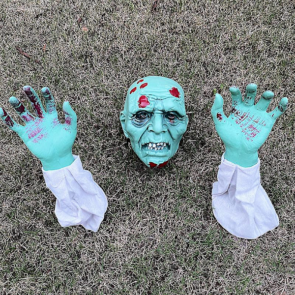 Halloween asettaa vanhan miehen pään puutarhakoristeen puutarhaan puuttuaksesi kolmiosaiseen huonepakotemppuun