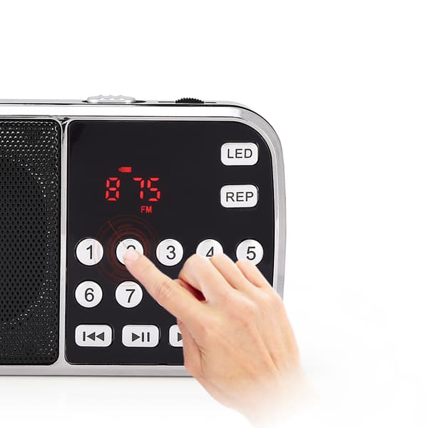 Kannettava musiikkisoitin LED-taskulampulla ja FM-radiolla