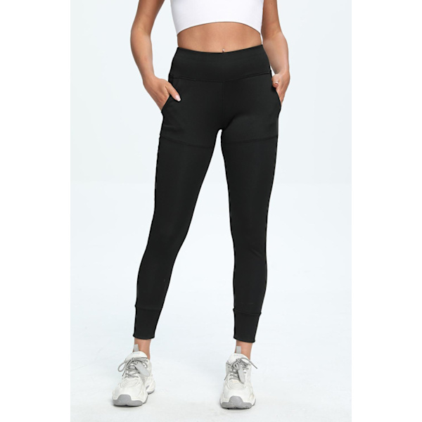 Mustat leggingsit taskuilla Black l