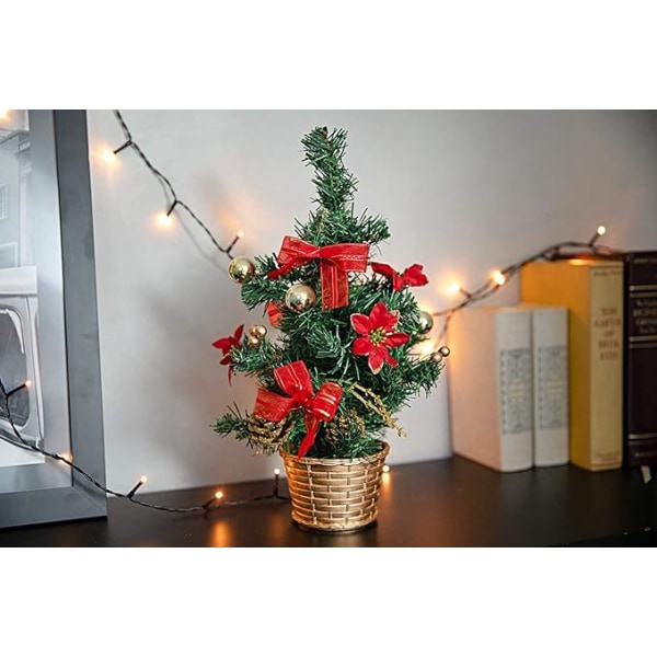 Dekorerad julgran – liten konstgjord julgran med smycken – guld, grön, röd – plastträd