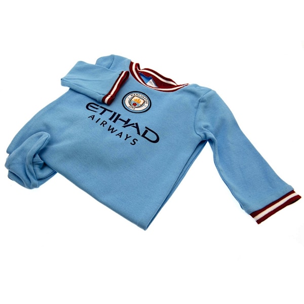 Manchester City FC Baby Crest Sleepsuit 12-18 månader Sky Blue/Röd Sky Blue/Red 12-18 Months