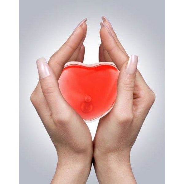 Återanvändbar handvärmare i form av ett hjärta. Röd