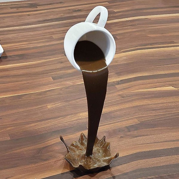 Flytande spillande kaffekopp Skulptur Köksinredning Spillande magic hällande stänk Brown