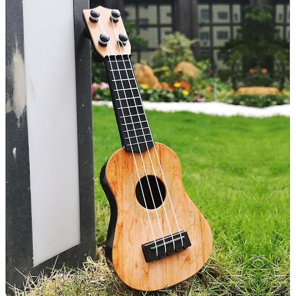 Ukulele barns mini fyrsträngad gitarrmusik upplysningsinstrument brown