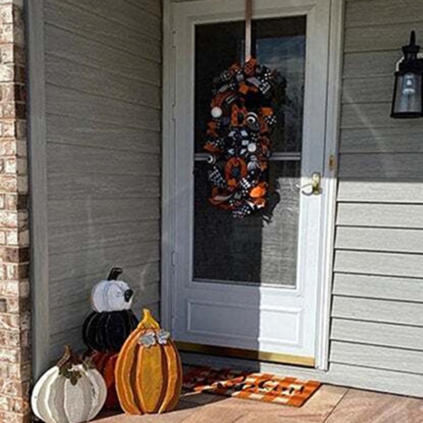 Halloween dekorkrans för ytterdörren hängande med pilbågar girland