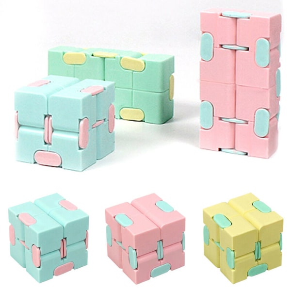Sensorisk stress Finger Rubiks cube toy för barn Vuxenpresent Pink