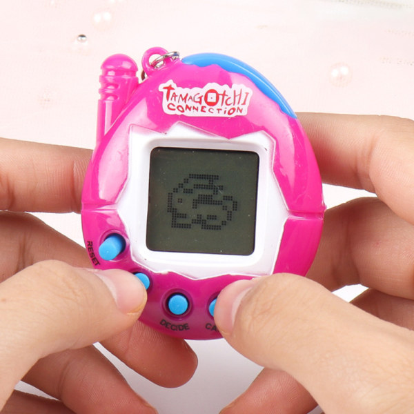 Elektronisk virtuell husdjursbarn baby Handhållen spelmaskin pink