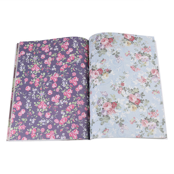 Dekorativt presentpapper med blommönster, presentpappersbok för högtider