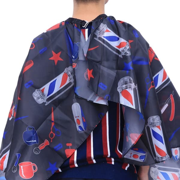 Svart hårklippekappe i polyester med spennelukking bak for salong