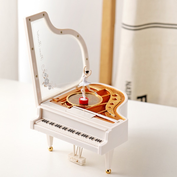 Pyörivä musiikkilaatikko, mekaaninen baletti Pyörivä musiikkilaatikko Caja