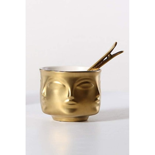 Dekorativ gullskål i keramikk med ansiktsmønster, smykker og nøkkelholder, vase til hjemmet til stuen