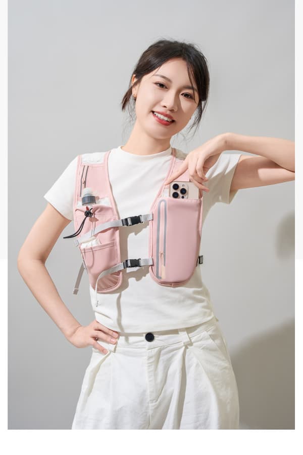 Men's and Women's Running Vest, 500ml Soft Flask Included, Lightweight Reflective Hydration Backpack with Adjustable Straps Pink