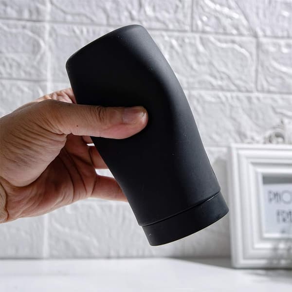 Black. Refillable dish soap dispenser, easy-squeeze silicone bottle with divider. Dispenser for hand soap, essential oil, lotion.