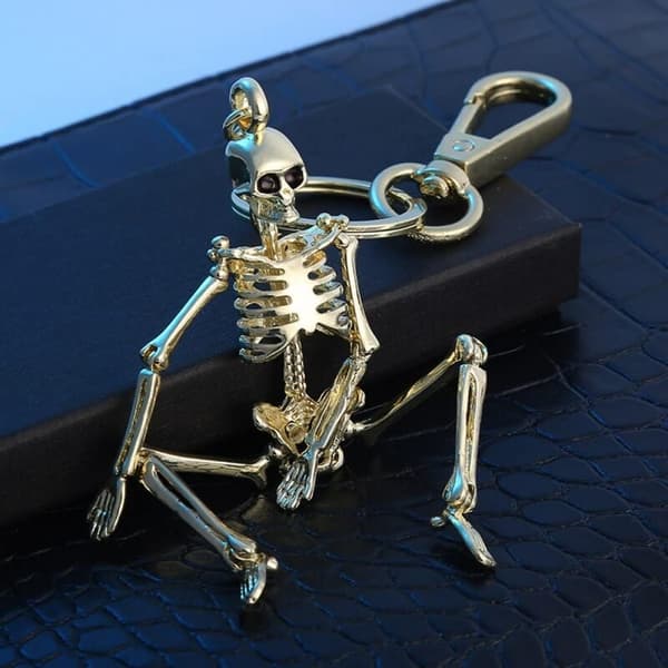 Dödskalle nyckelring, vikbar skeletthänge Bronze