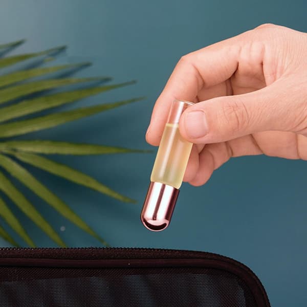 2 ml glasrullflaskor för eteriska oljor 10 st påfyllningsbar parfym med roséguldlock och kulor i rostfritt stål Researomaterapi