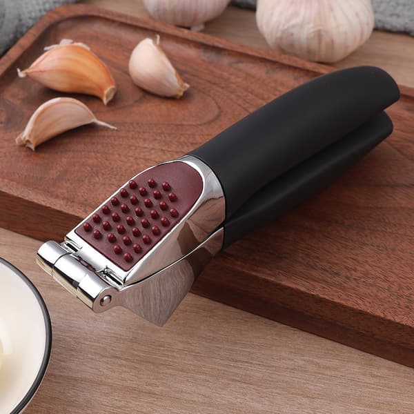 Garlic Press - A simple kitchen tool for crushing garlic
