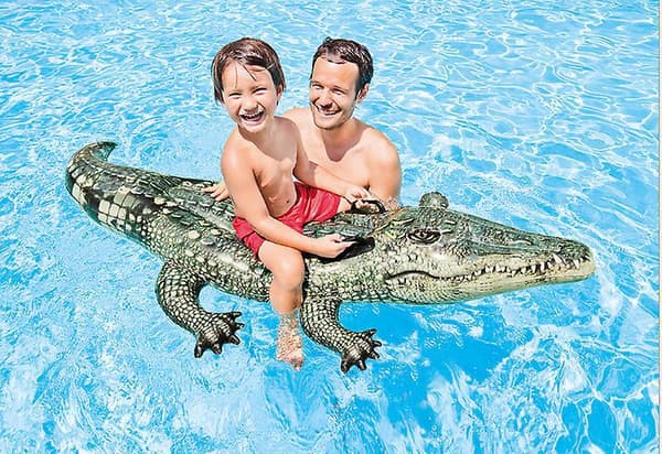 Ratsastava alligaattoripoiju